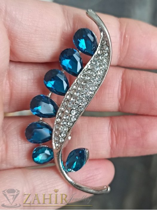 Дамски бижута - Елегантна брошка с големи лазурно сини и малки бели кристали на сребриста основа, размер 6 на 2 см, прецизна изработка - B1352